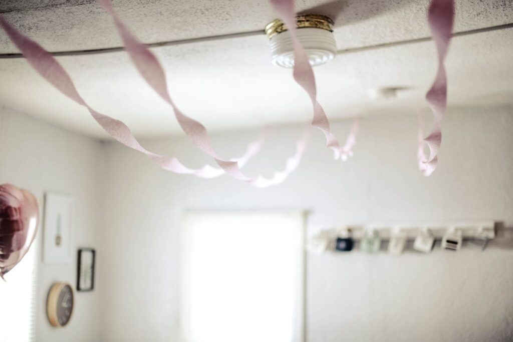 pink streamers hanging on the ceiling