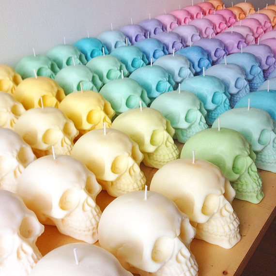 pastel colored skull candles lined up - 10 halloween themes