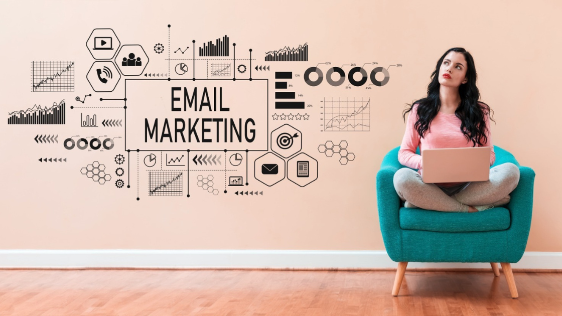 woman sits in a green chair in front of a pink wall that says email marketing. 
 DIY MARKETING: How to promote your one-person business