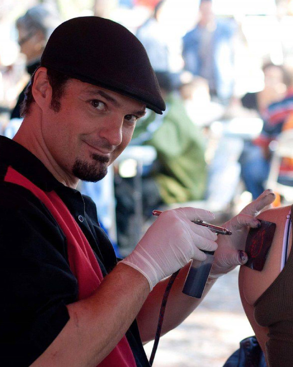 Hire an airbrush tattoo artist for your next event.