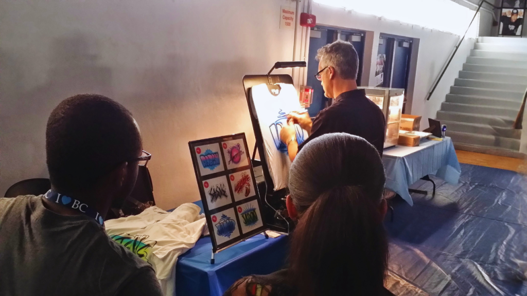 Airbrush Events artist creates custom work.