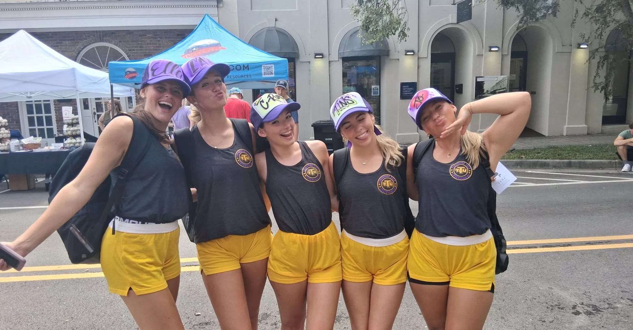 Students wearing custom airbrush hats from Airbrush Events